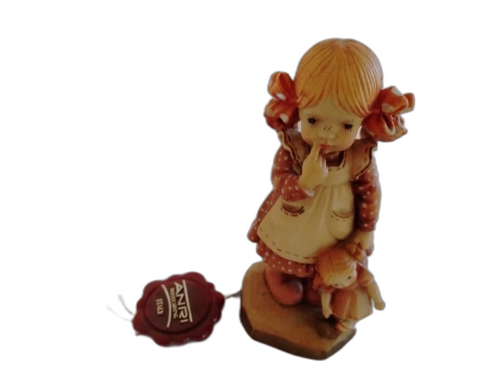 A-138 - Girl Holding a Doll - Photo 1