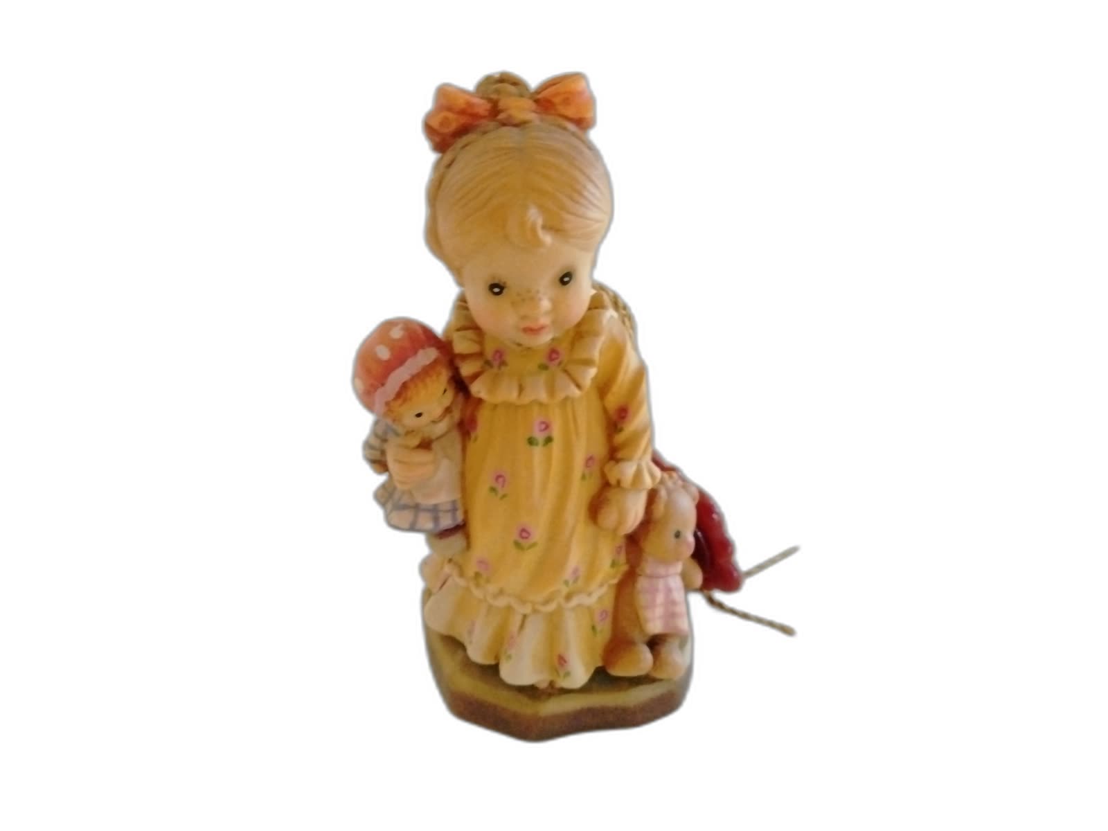 A-140 - Girl Carrying Teddy Bear and Doll - Photo 1