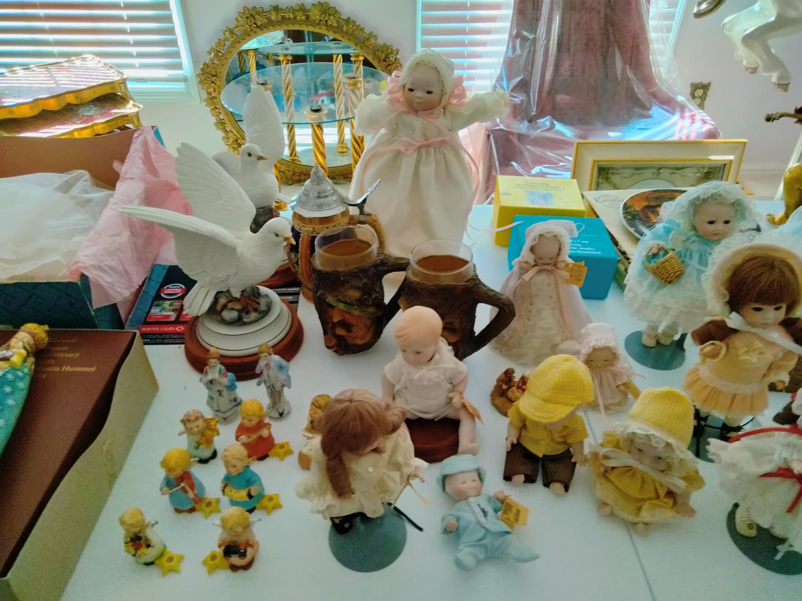 C3-016 Assorted collectible dolls and figurines image 1